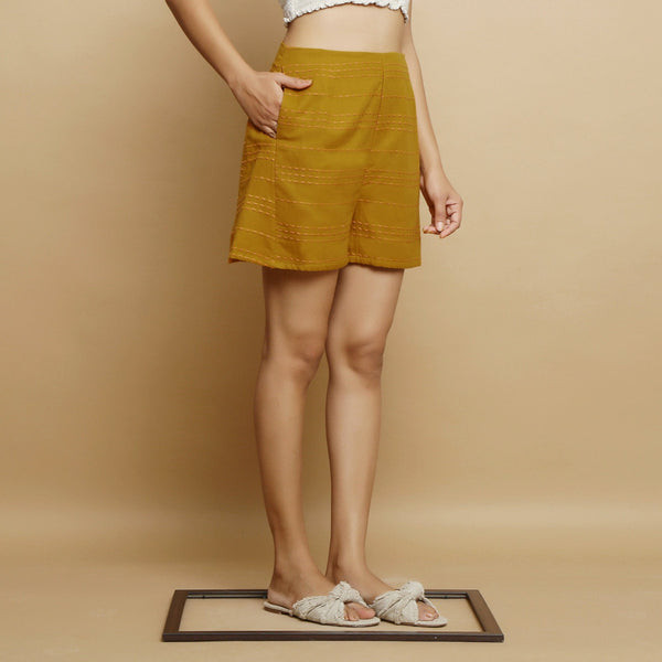 Right View of a Model wearing Striped Handwoven Flared Godet Shorts
