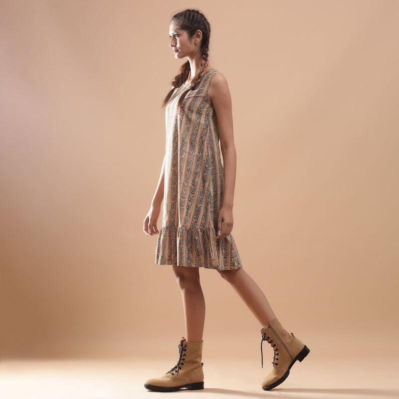 Left View of a Model wearing Striped Block Printed Cotton Knee Length Dress