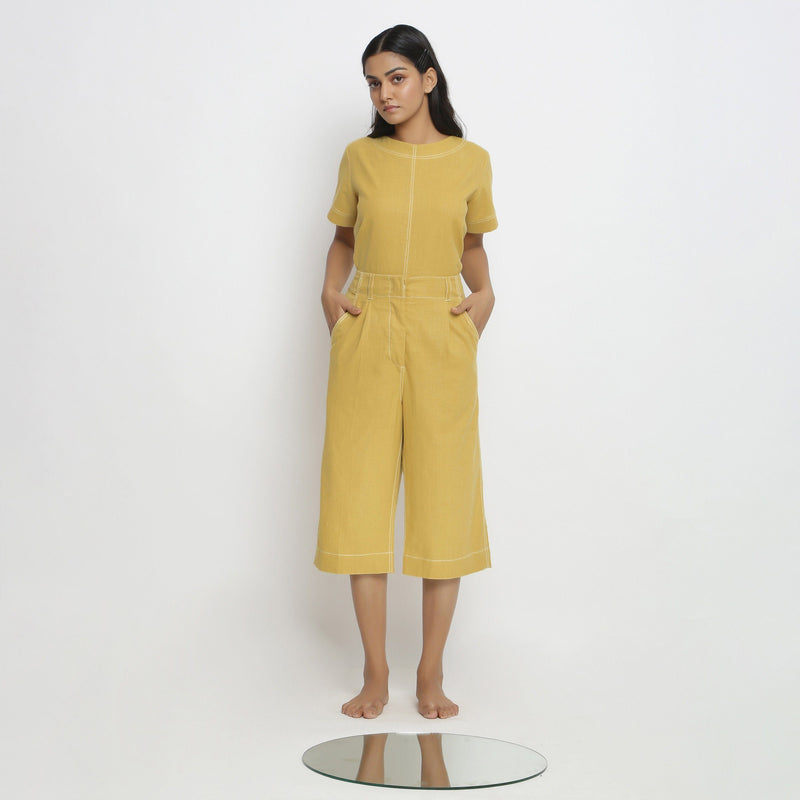 Front View of a Model wearing Breezy Light Yellow Top and Culottes Set