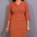 Front Detail of a Model wearing Sunset Rust Warm Cotton Corduroy Front Slit Maxi Dress