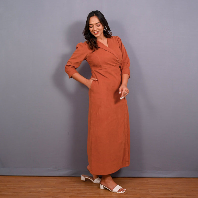 Right View of a Model wearing Sunset Rust Warm Cotton Corduroy Front Slit Maxi Dress