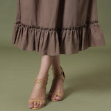 Close View of a Model wearing Taupe Cotton Mid-Rise Ruffled Elasticated Midi Skirt