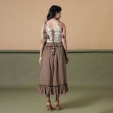 Back View of a Model wearing Taupe Cotton Mid-Rise Ruffled Elasticated Midi Skirt