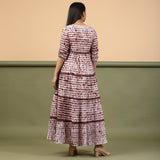 Back View of a Model wearing Taupe Shibori Tie-Dye Cotton Ankle Length Tier Bohemian Dress
