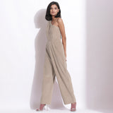 Left View of a Model wearing Taupe Beige Corduroy One-Shoulder Jumpsuit