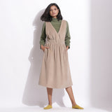 Front View of a Model wearing Taupe Beige Warm Cotton Corduroy Pinafore Midi Dress