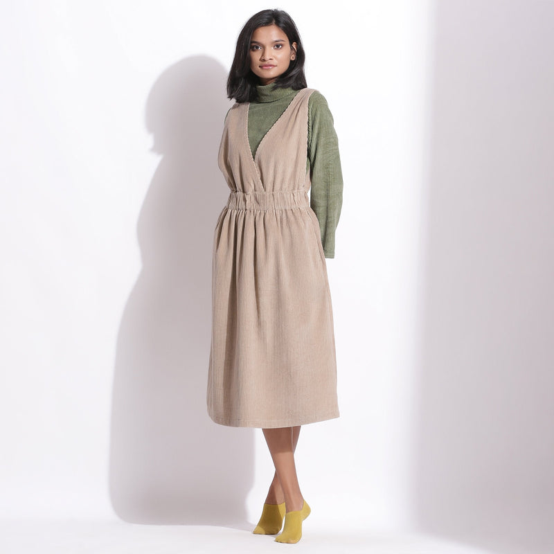 Front View of a Model wearing Taupe Beige Warm Cotton Corduroy Pinafore Midi Dress