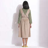 Back View of a Model wearing Taupe Beige Warm Cotton Corduroy Pinafore Midi Dress