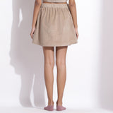 Back View of a Model wearing Taupe Beige Warm Cotton Corduroy Short Overlap Skirt