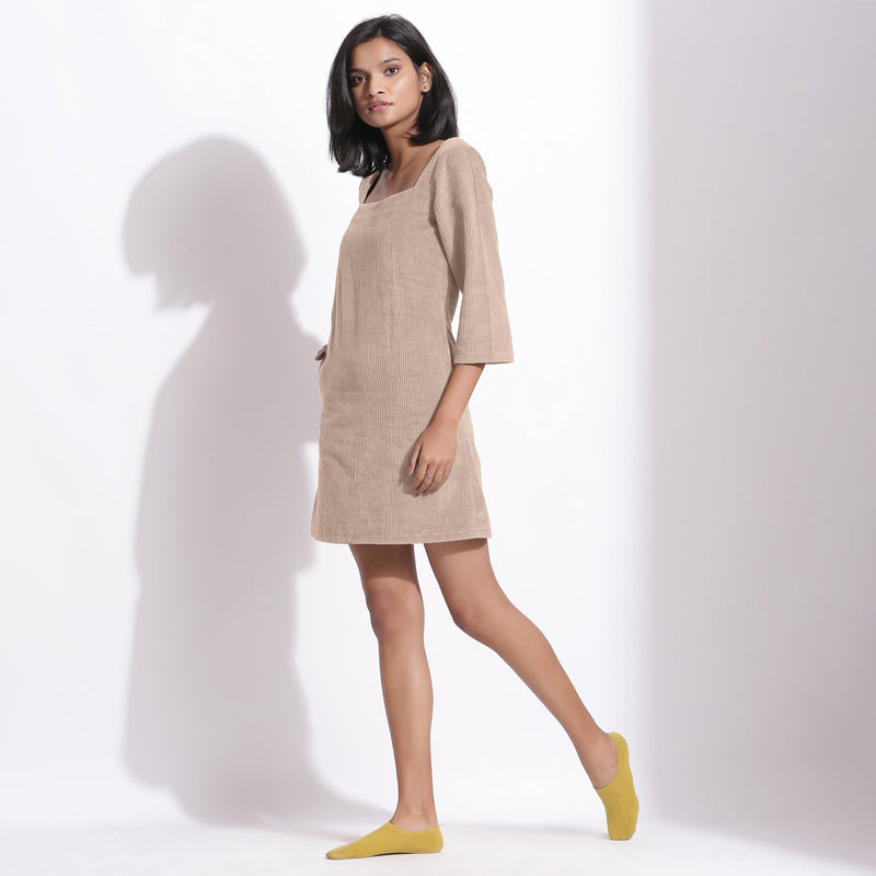 Left View of a Model wearing Taupe Beige Cotton Corduroy Square Neck Dress