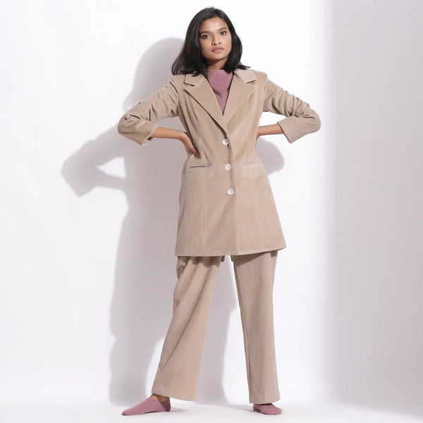 Front View of a Model wearing Taupe Beige Trouser Pant and Long Coat Set