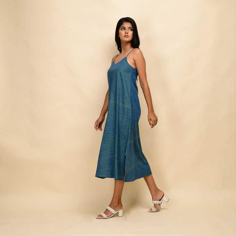 Left View of a Model wearing Teal 100% Cotton Khadi A-Line Dress