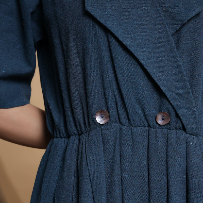 Front Detail of a Model wearing Teal Blue Lapel Collar Pleated Jumpsuit