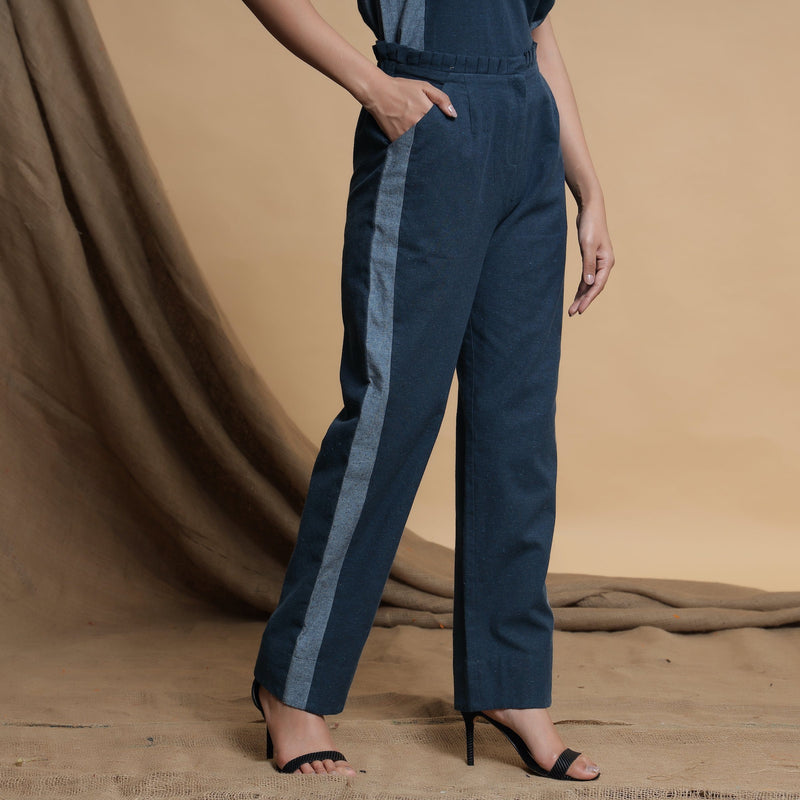 Right View of a Model wearing Teal Blue Side-Panelled Paperbag Pant
