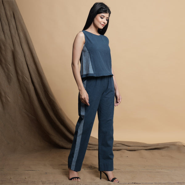 Right View of a Model wearing Teal Blue Side-Panelled Paperbag Pant