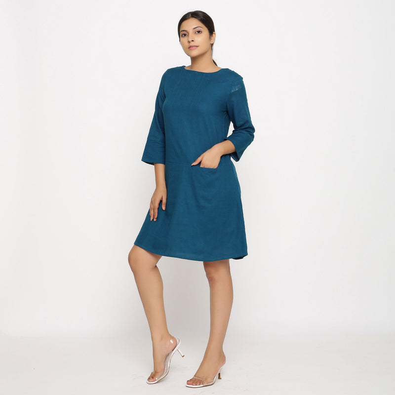 Front View of a Model wearing Teal Blue Yoked Cotton Tunic Dress
