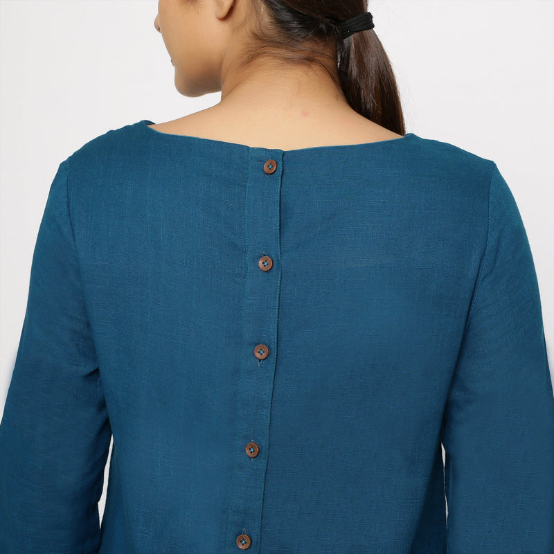 Back Detail of a Model wearing Teal Blue Yoked Cotton Tunic Dress