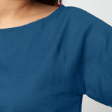 Front Detail of a Model wearing Teal Boat Neck Half Sleeve Cotton Top