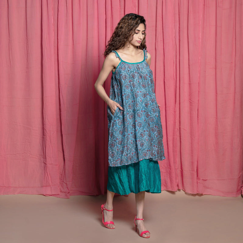 Right View of a Model wearing Teal Cotton Chanderi Block Print Midi Tent Dress