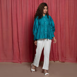 Right View of a Model wearing Teal Cotton Chanderi Balloon Sleeves Tier Top