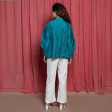 Back View of a Model wearing Teal Cotton Chanderi Balloon Sleeves Tier Top