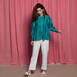 Front View of a Model wearing Teal Cotton Chanderi Balloon Sleeves Tier Top