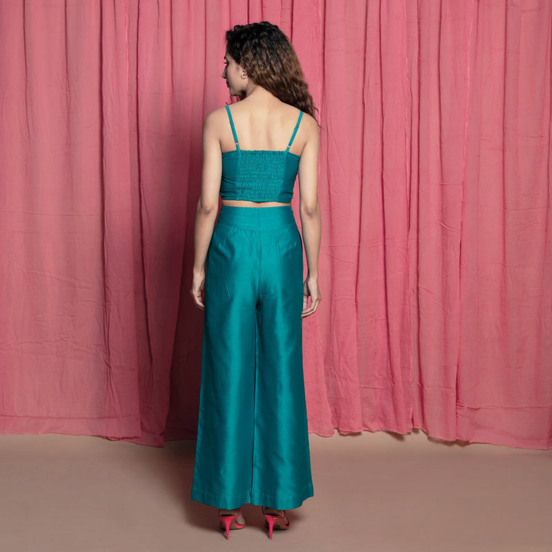Back View of a Model wearing Teal Chanderi Crop Top and Pant Set