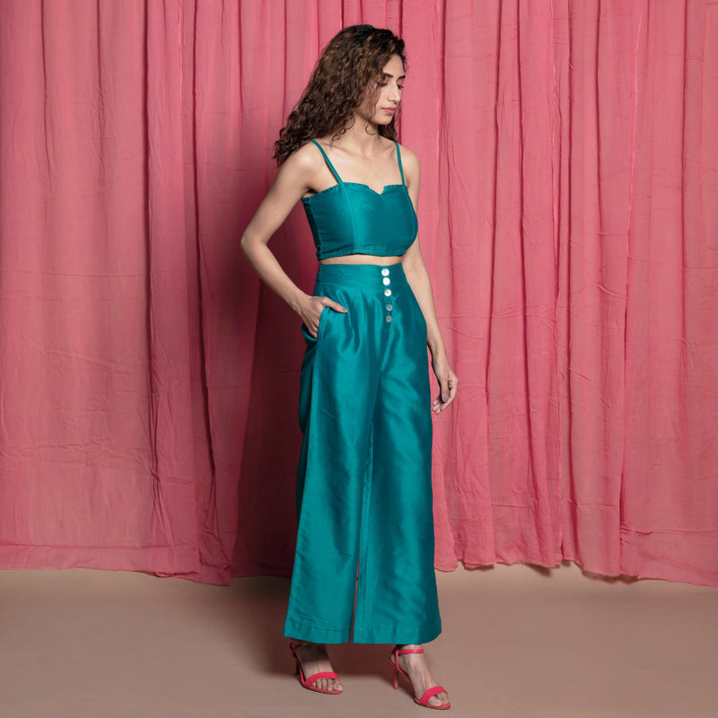 Right View of a Model wearing Teal Chanderi Crop Top and Pant Set