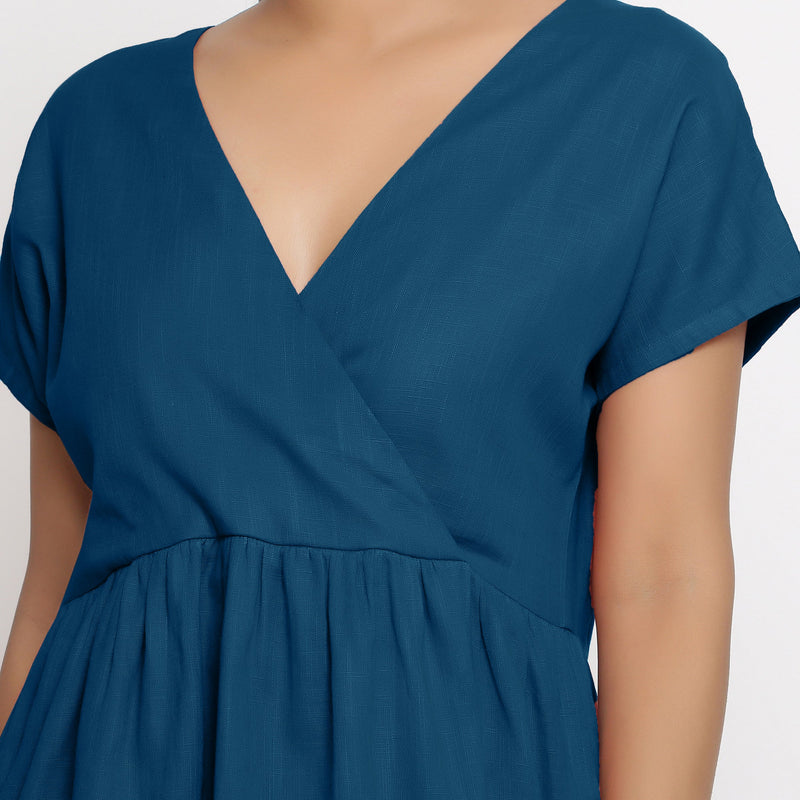 Front Detail of a Model wearing Teal Cotton Solid Wrap Dress