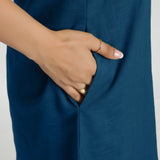 Right Detail of a Model wearing Teal Criss-Cross Cotton A-Line Dress