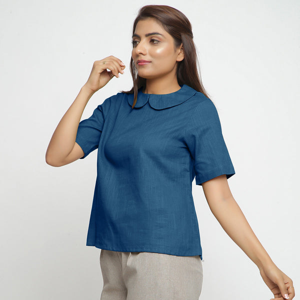 Left View of a Model wearing Teal Everyday Essential A-Line Top
