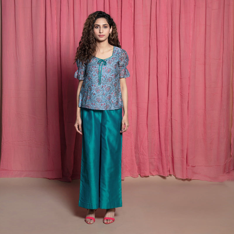 Front View of a Model wearing Teal Hand Block Printed Chanderi Paneled Top