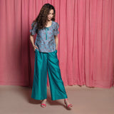 Right View of a Model wearing Teal Hand Block Printed Chanderi Paneled Top