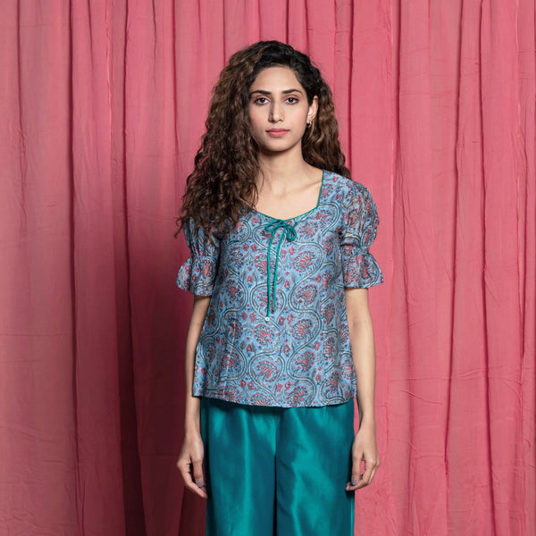 Front View of a Model wearing Teal Hand Block Printed Chanderi Paneled Top