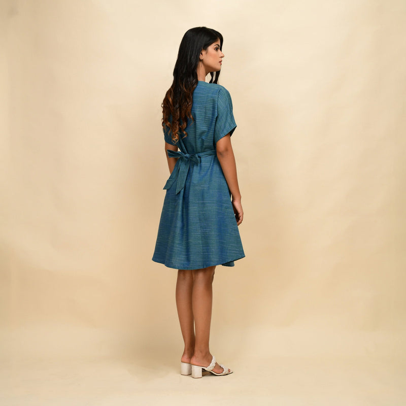 Back View of a Model wearing Teal 100% Cotton Blouson Dress