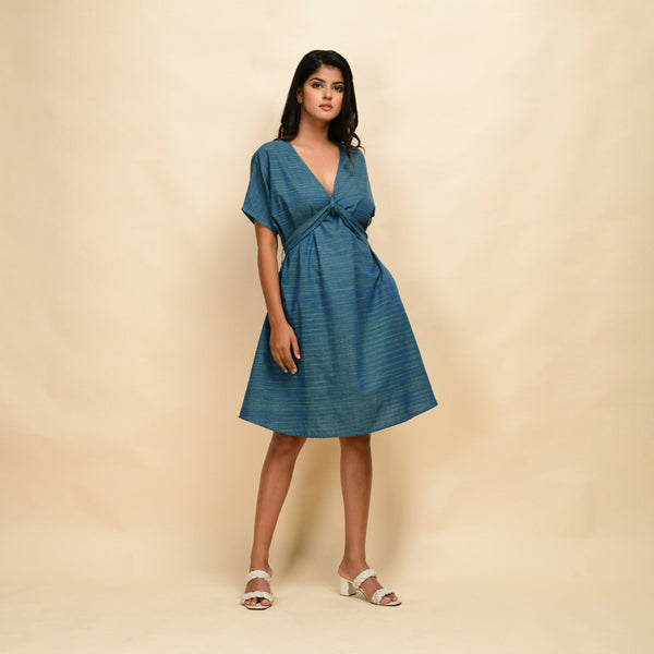 Right View of a Model wearing Teal 100% Cotton Blouson Dress