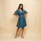 Front View of a Model wearing Teal 100% Cotton Blouson Dress