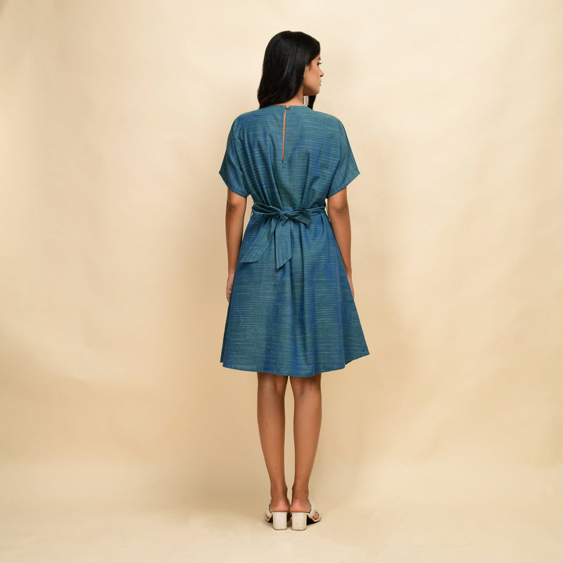 Back View of a Model wearing Teal 100% Cotton Blouson Dress