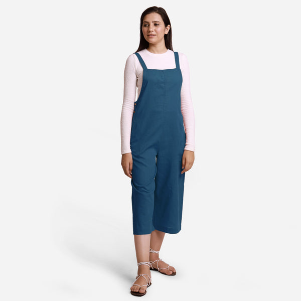 Front View of a Model wearing Teal Pinafore Midi Length Dungaree