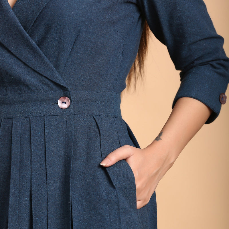 Front Detail of a Model wearing Teal Pleated Knee Length Wrap Dress