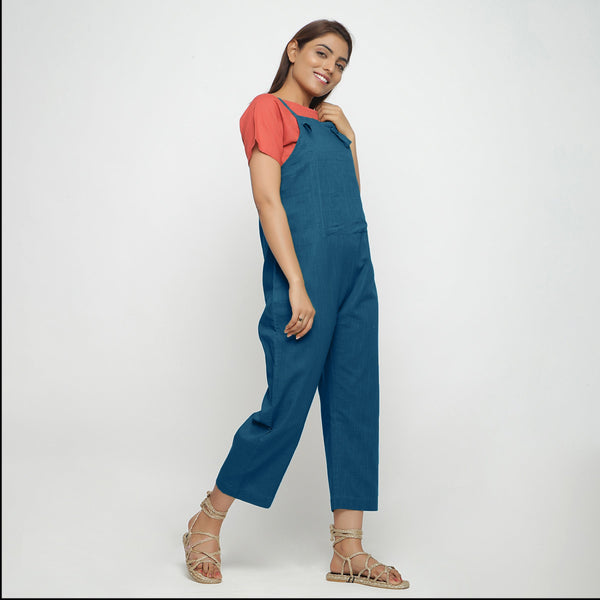 Right View of a Model wearing Teal Strap Sleeve Solid Dungaree