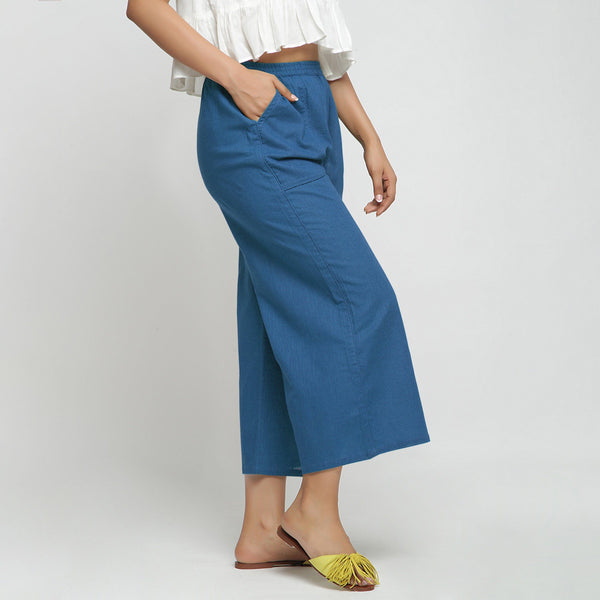 Right View of a Model wearing Teal Wide Legged Straight Pant