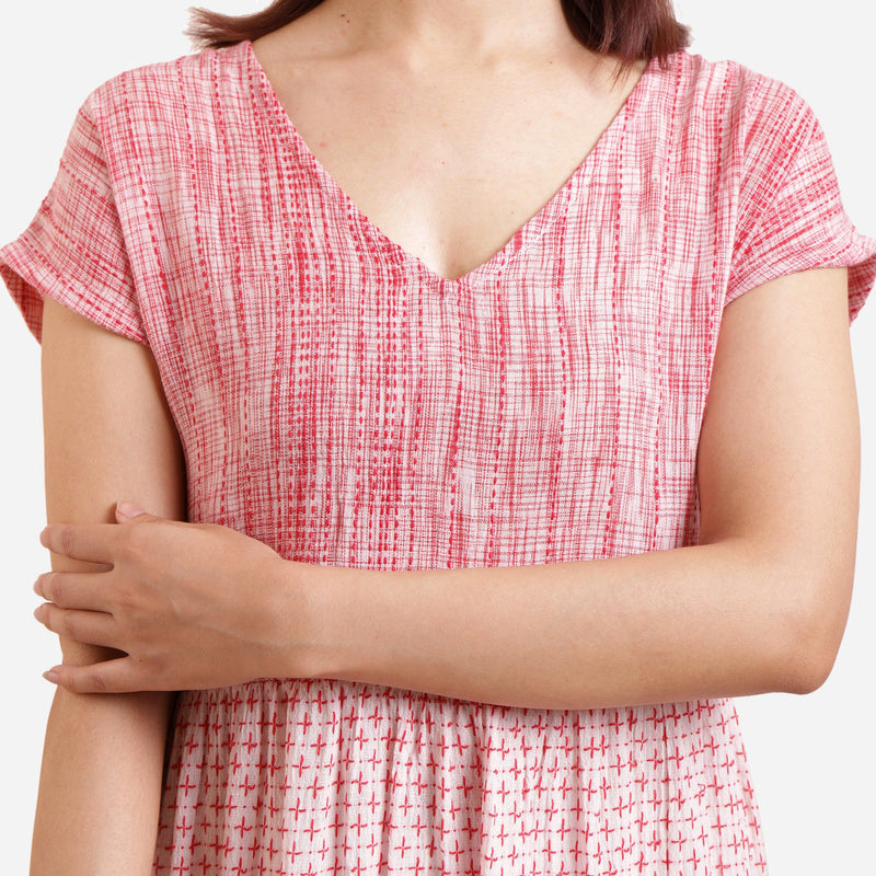 Front Detail of a Model wearing Crinkled Cotton V-Neck Tiered Midi Sundress