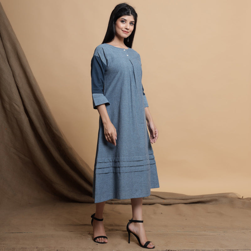 Right View of a Model wearing Turkish Blue A-Line Yoked Maxi Dress
