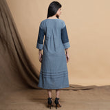 Back View of a Model wearing Turkish Blue A-Line Yoked Maxi Dress