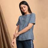 Left View of a Model wearing Turkish Blue Boat Neck Shirt