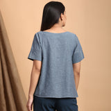 Back View of a Model wearing Turkish Blue Boat Neck Shirt