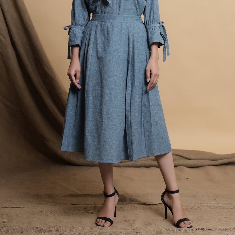 Front View of a Model wearing Turkish Blue Pleated Midi Skirt