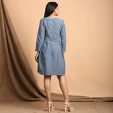 Back View of a Model wearing Turkish Blue Pleated Short Dress