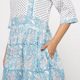 Front Detail of a Model wearing Turquoise Block Printed Cotton Midi Dress